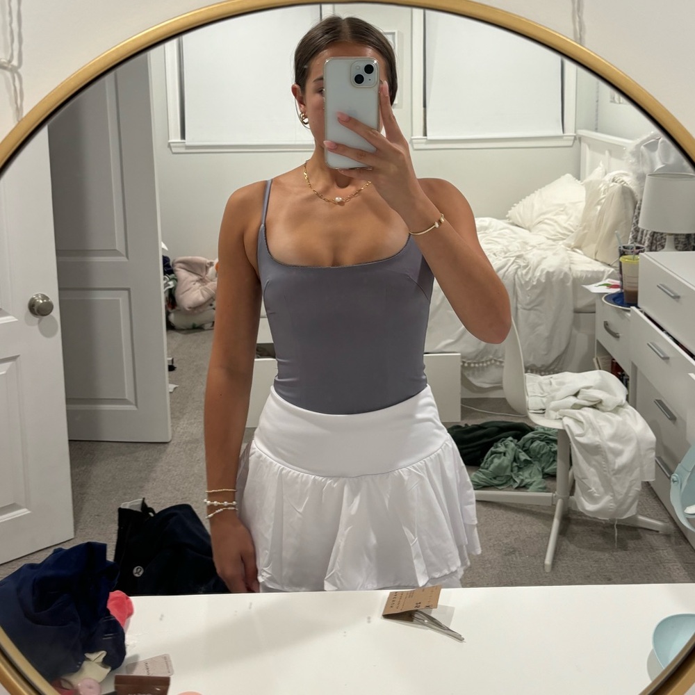 White fox bodysuit!